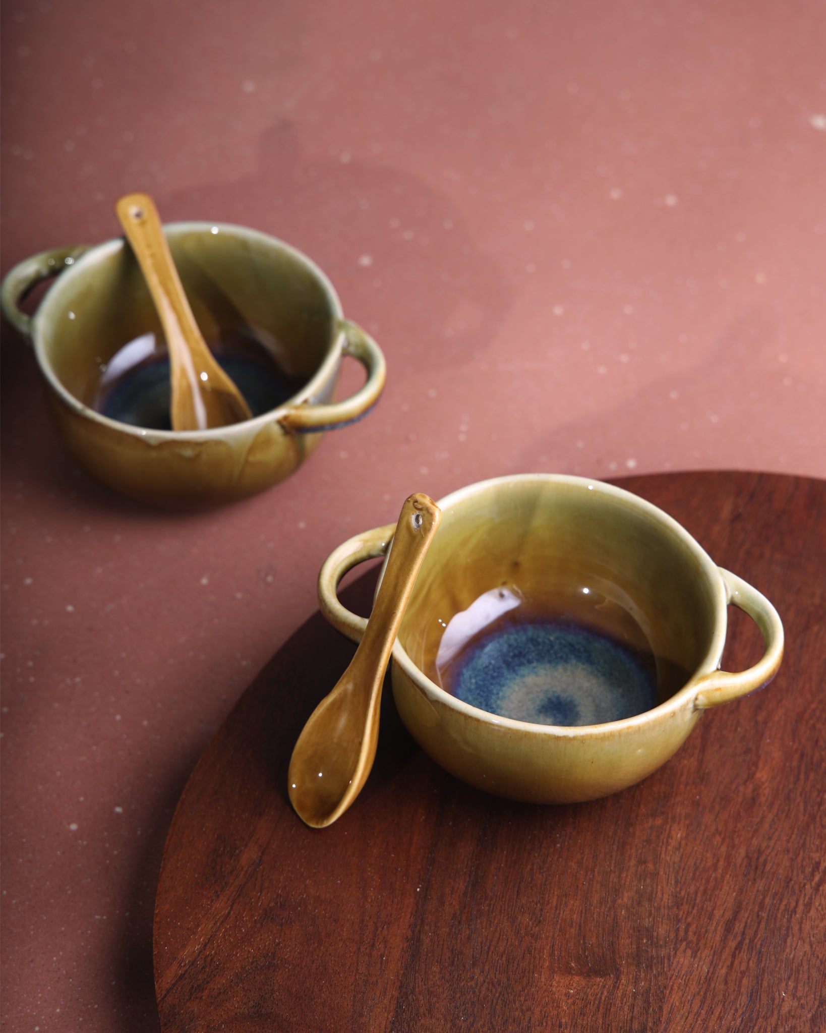 Studio pottery bowls with horizontal handle, turquoise and lapis mixed with earthern colours, good for hot soups, indus valley
