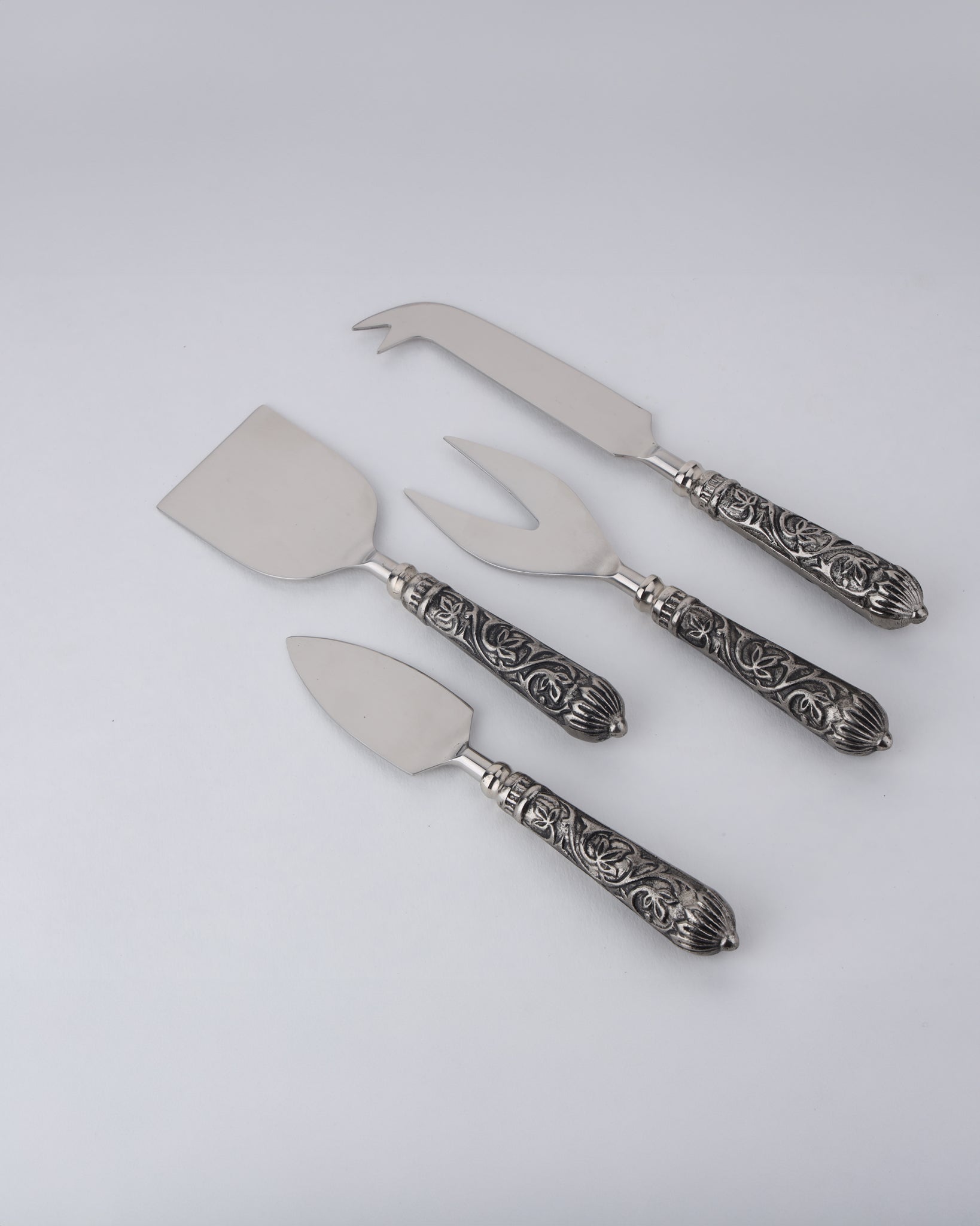 charcuterie board, cheese platter, cheese board, grazing table, pronged knife, chisel