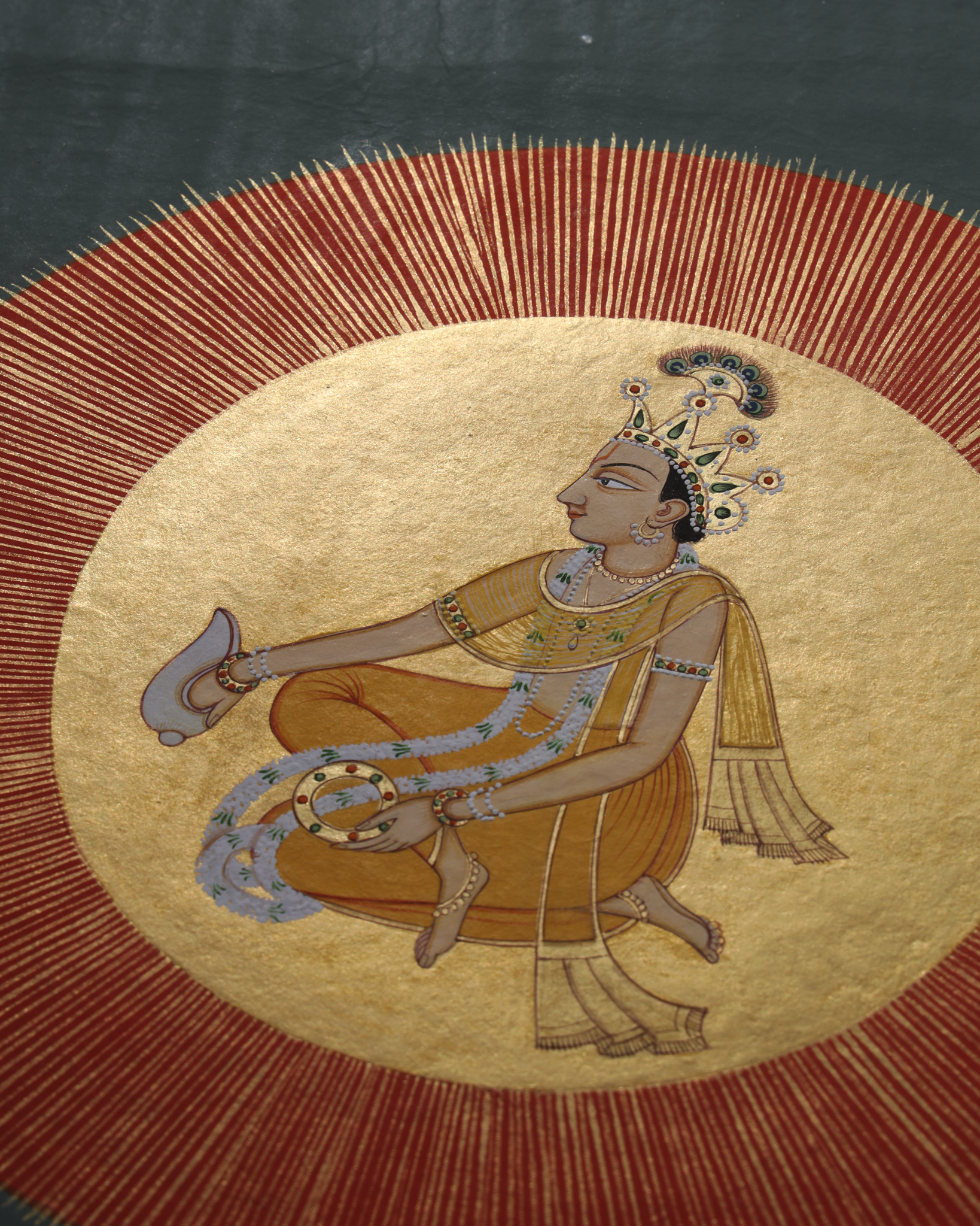Miniature painting of Vedic God Surya 23kt gold paint natural colours on basli paper