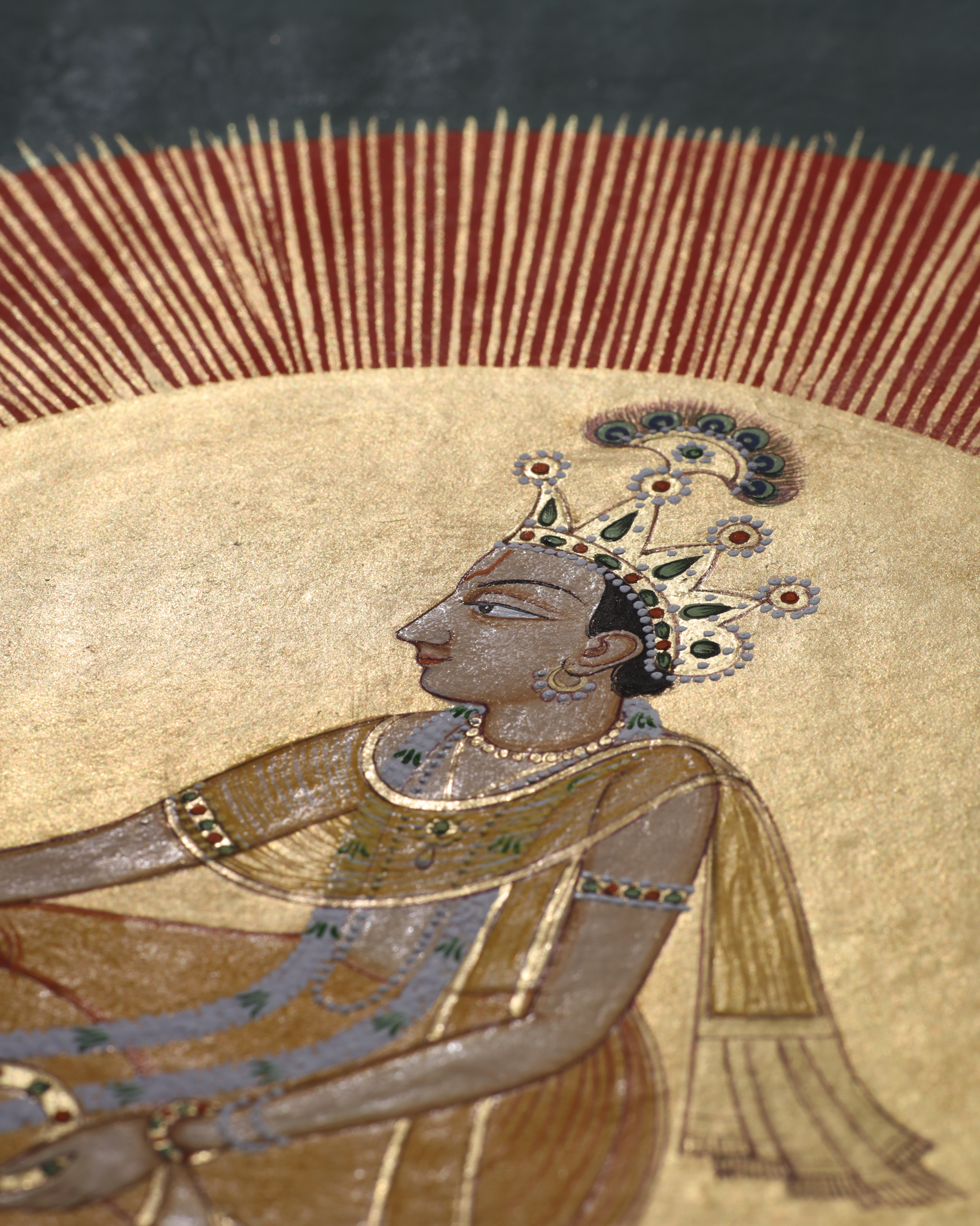 Miniature painting of Vedic God Surya 23kt gold paint natural colours on basli paper
